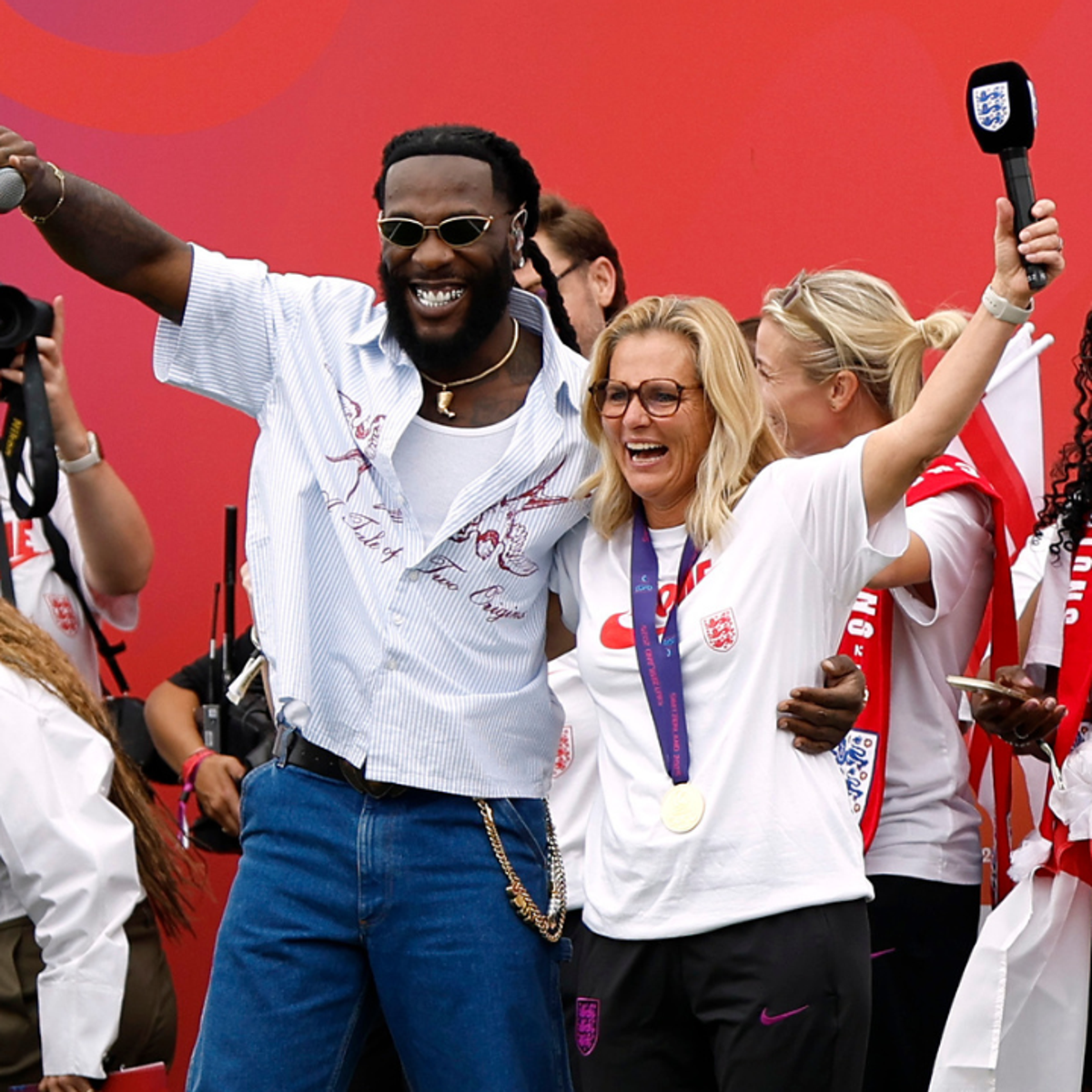 Burna Boy and Sarina Wiegman, the England manager