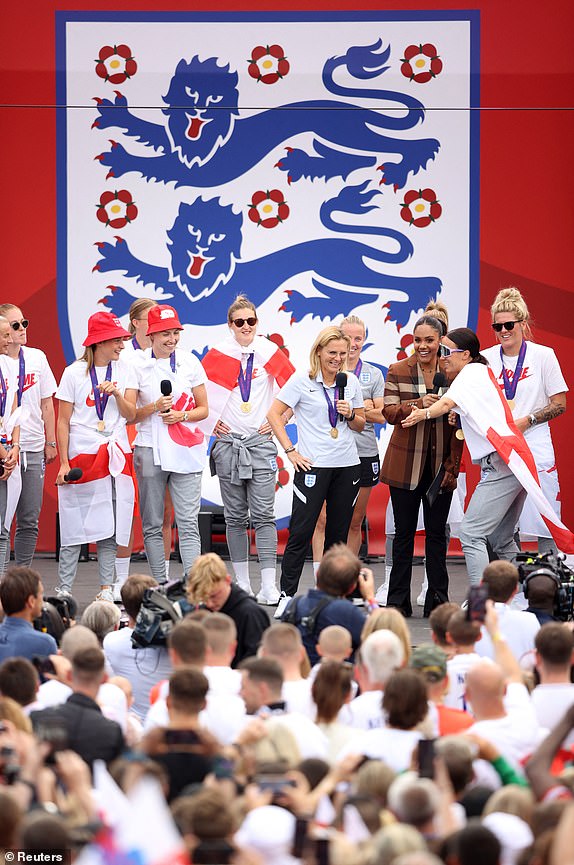 Burna Boy and Sarina Wiegman, the England manager