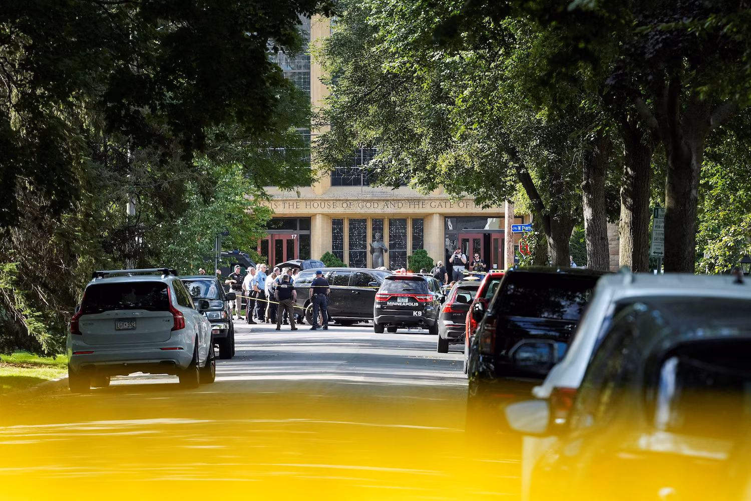 Law enforcement officers gather outside Annunciation Church following a mass shooting event, in Minneapolis, Minnesota, August 27, 2025. Tim Evans/Reuters