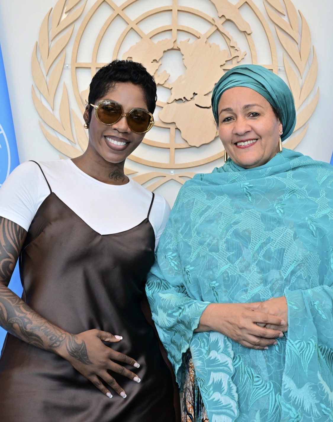 Tiwa Savage and Amina J. Mohammed at the United Nations Headquarters in New York.