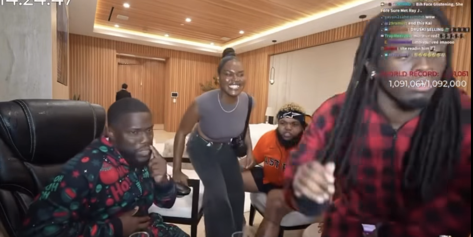 Adetola Adejokun during a live broadcast with U.S. streamer Kai Cenat and comedian Kevin Hart